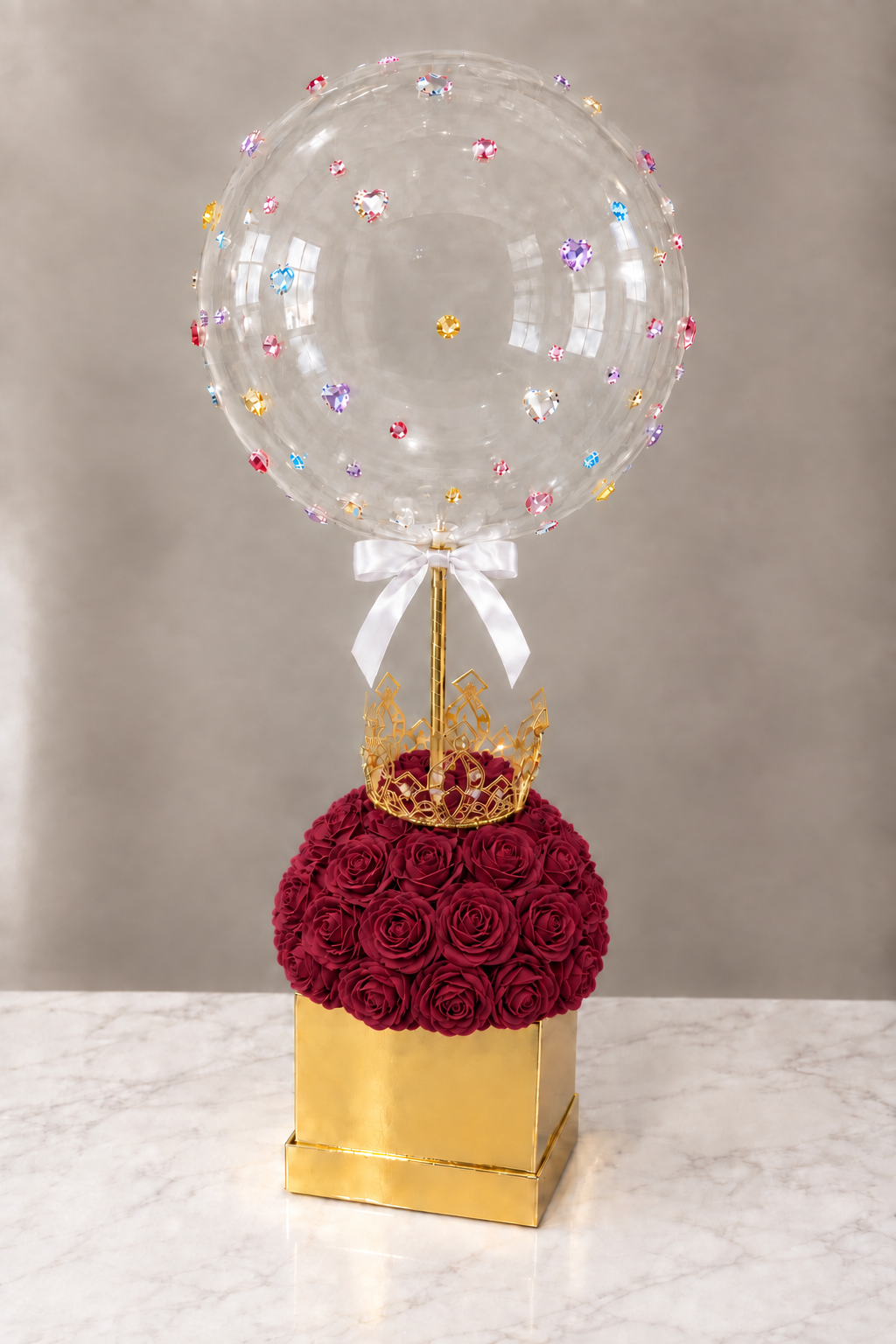 Golden Box arrangement with more realistic burgundy faux roses
