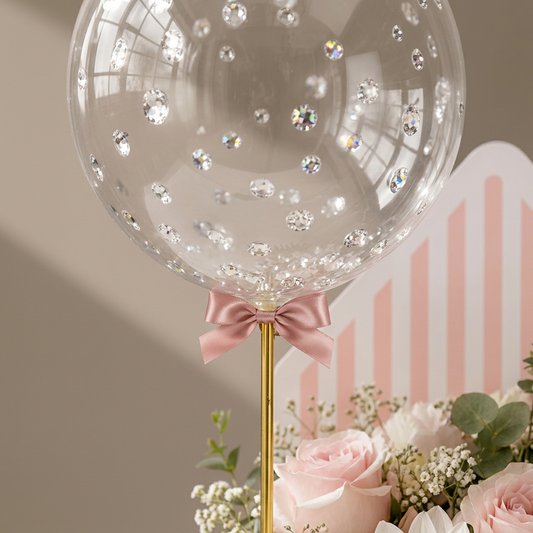 Jewel balloon and pink bow close-up